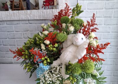 RAMO FLORES CON MUÑECO